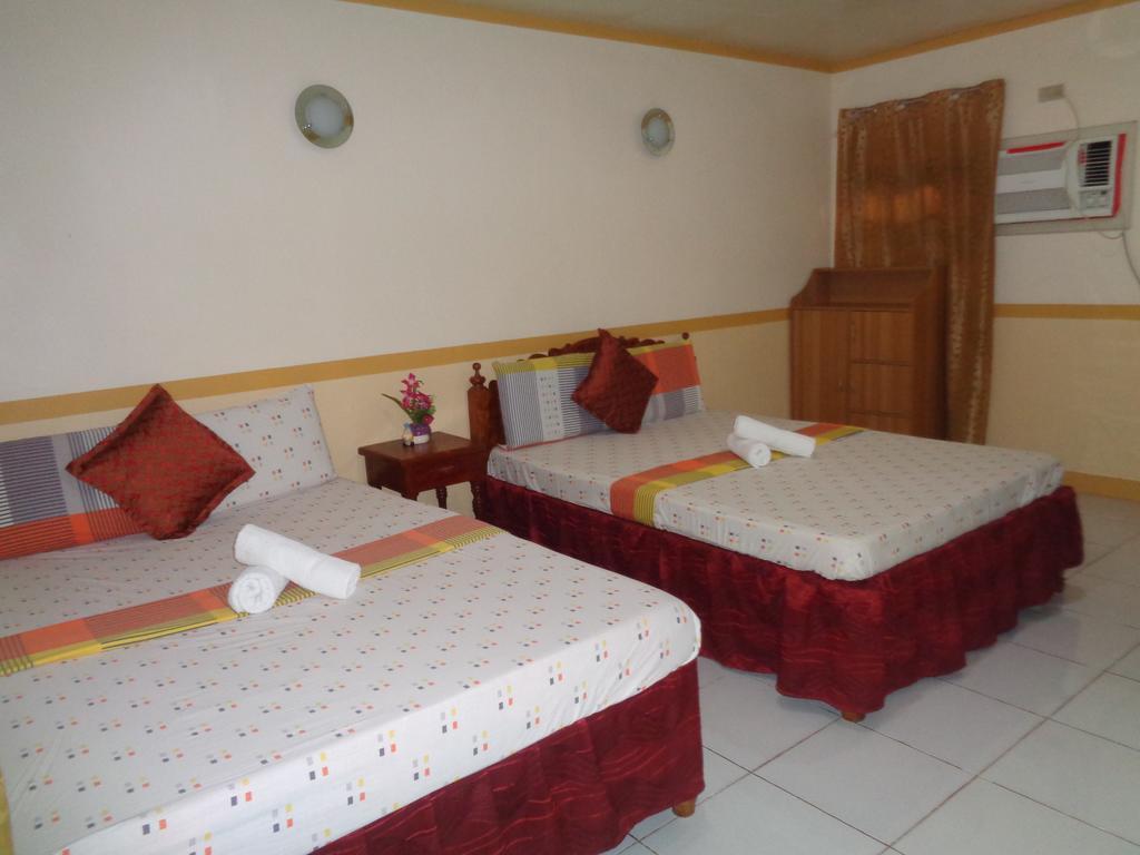 D'Lucky Garden Inn & Suites Tiniguiban エクステリア 写真