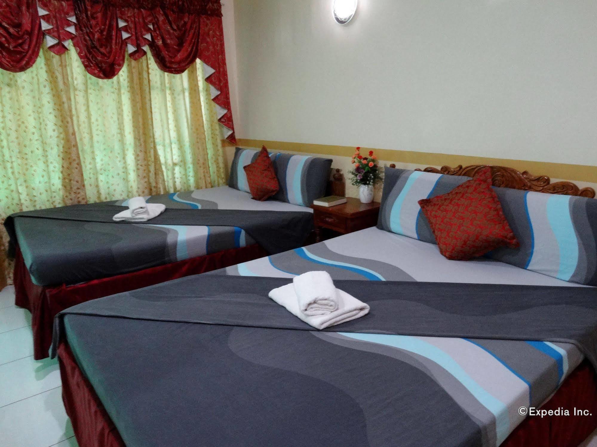 D'Lucky Garden Inn & Suites Tiniguiban エクステリア 写真