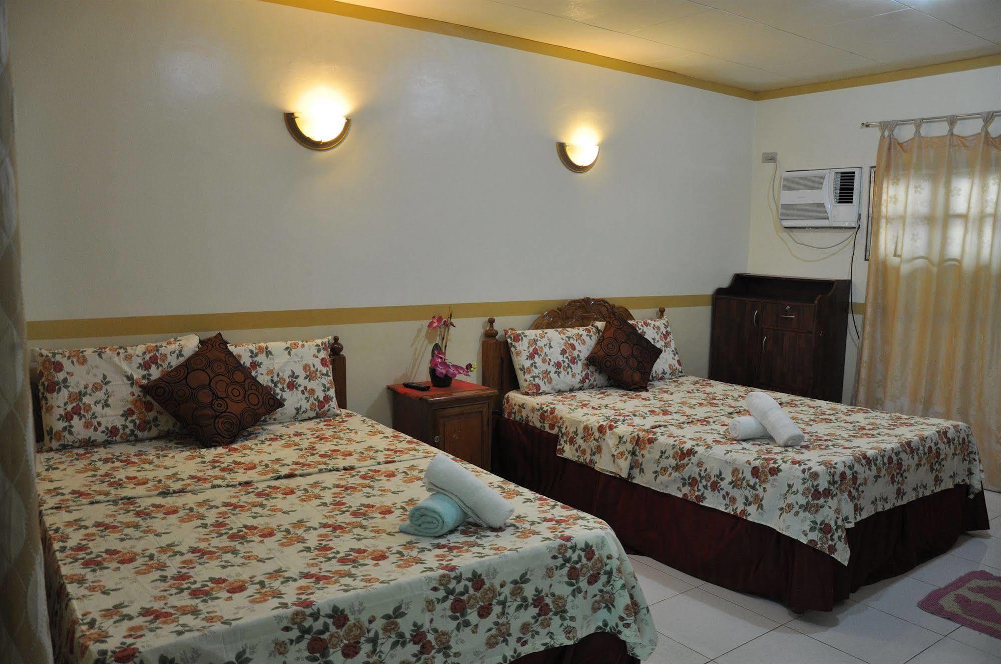 D'Lucky Garden Inn & Suites Tiniguiban エクステリア 写真