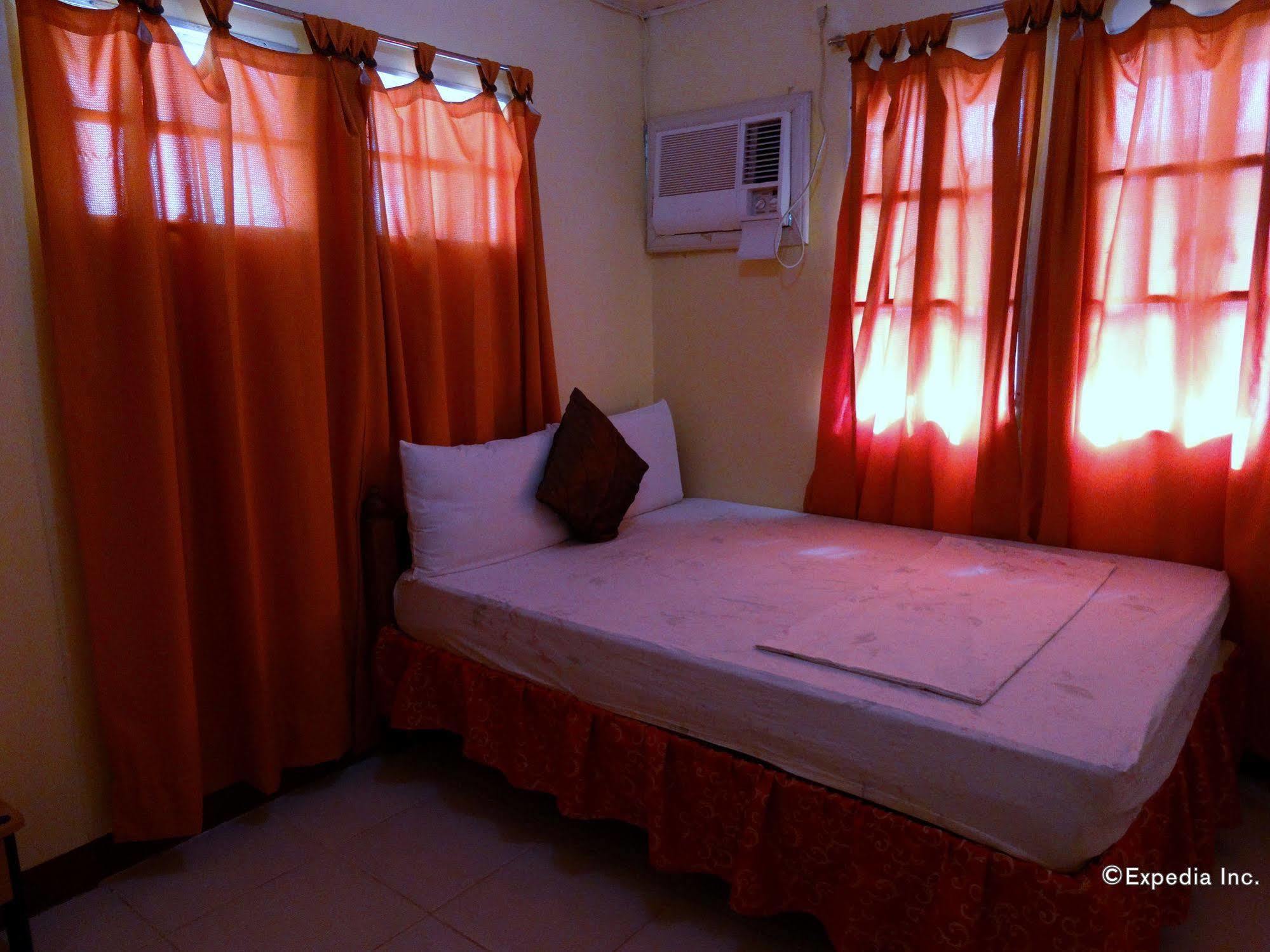D'Lucky Garden Inn & Suites Tiniguiban エクステリア 写真