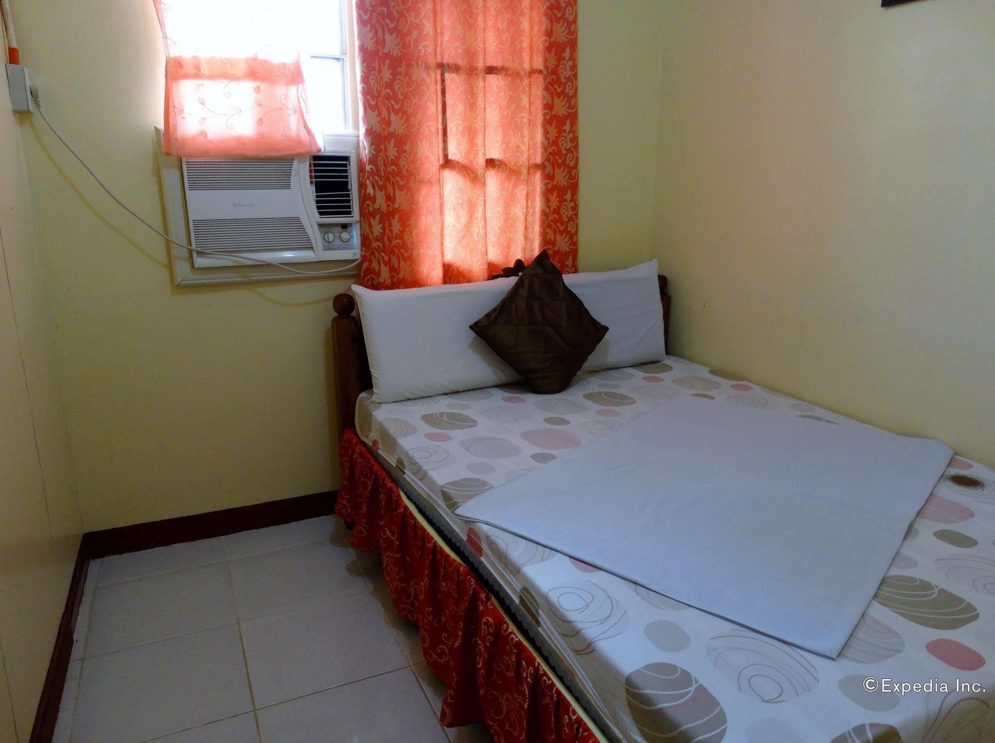 D'Lucky Garden Inn & Suites Tiniguiban エクステリア 写真